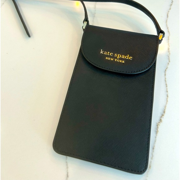 kate spade Accessories - NWOT Kate Spade phone- card holder.Strap is 48”. Purse is 4.5” x 7.5”. Black